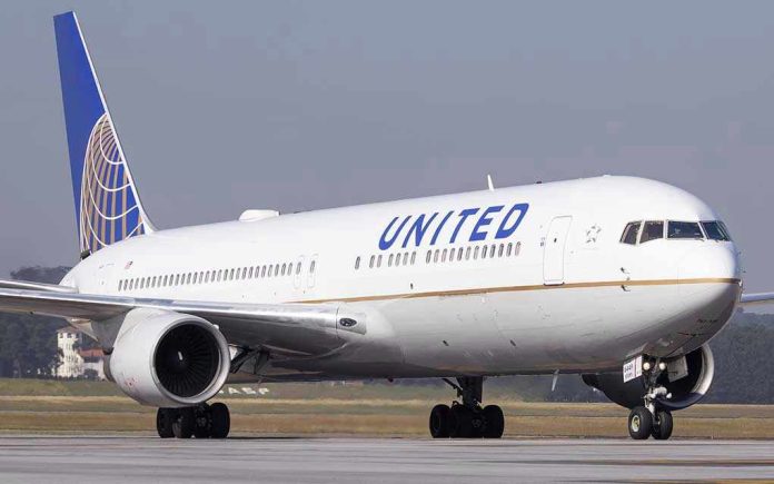 623296490 United Airlines plane on the runway
