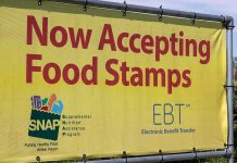 SNAP Funding COLLAPSES — Deadline Looms! Yellow sign now accepting food stamps EBT SNAP