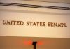 Senate FREEZES Fed Salaries—Cash Their OWN! Sign displaying United States Senate in a government building