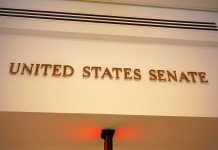 Senate FREEZES Fed Salaries—Cash Their OWN! Sign displaying United States Senate in a government building