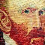 Met Museum SUED – CONTROVERSIAL Art Piece Displayed Colorful mural of a mans face on a brick wall