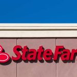 State Farm logo displayed on a building against a blue sky