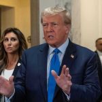 Trump Attorney RANSACKED – Office Invasion! Man speaking with hands raised, woman and security behind.