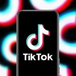 TikTok app logo on a smartphone screen.