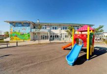 Minnesota Fraud Scandal Linked to Somali Government Colorful playground slide in front of a building.