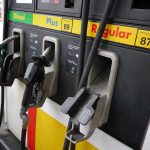 Gas station pumps for diesel, plus, and regular fuel.