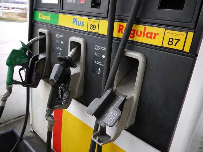 Gas station pumps for diesel, plus, and regular fuel.
