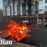 Migrant DECAPITATES Citizen Causing National Uprising! Bus and cars burned in anti-immigration protests in Belfast after stabbing