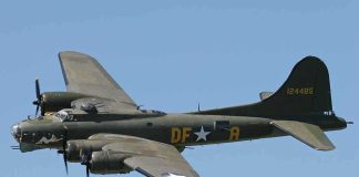 Forgotten WW2 Bomb DESTROYS Village! Boeing B-17 flying against a clear blue sky