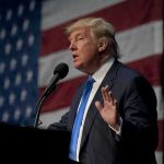 Trump Demands GOP Lawmakers IMMEDIATELY Pass $350B Military Bill! man in suit speaking at a podium with a US flag backdrop