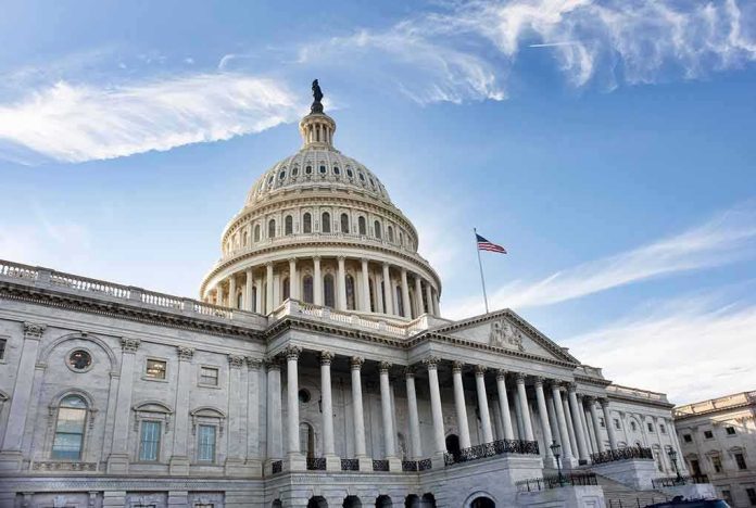 shutterstock_1018169170 United States Capitol building under a blue sky