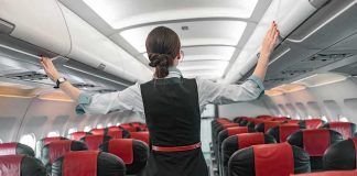 ICE Takes Down Flight Attendant Mid-Flight! Flight attendant checks overhead bins in empty airplane cabin