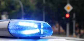 Five Officials and Mayor ARRESTED For Fraud Police car blue siren light flashing