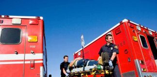 Paramedics EMBARRASSING Blunder Murders Patient Paramedics move a patient on a stretcher between red ambulances