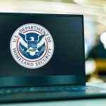 Trump Finds LOOPHOLE After Birthright Ruling Laptop displaying U.S. Department of Homeland Security logo.