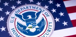 U.S. Department of Homeland Security emblem on American flag