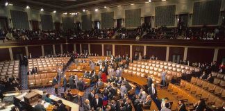 Insider Trading Showdown Hits Congress Legislative chamber with members gathering on the floor