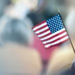 Dem Candidate SNUBS Flag – Sparks National Uproar American flag on a small handheld stick