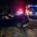Fed Prosecutor Charged in Shocking Hit-and-Run! Crashed car on a dark roadside with emergency vehicles