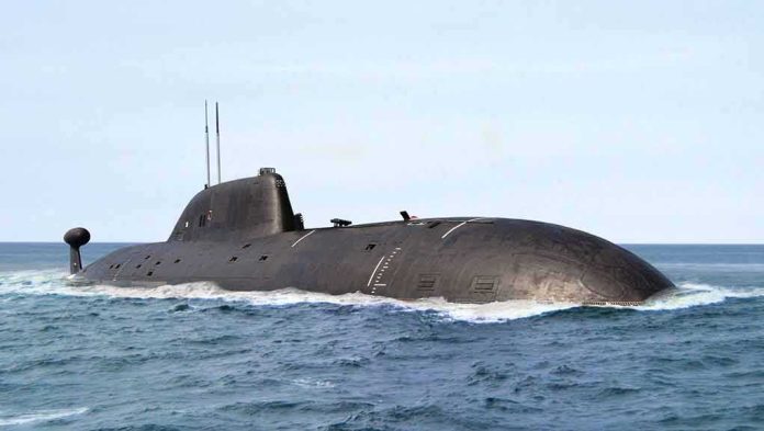 shutterstock_1328617943 Submarine cruising on the ocean surface