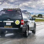 Sheriff SUV driving on a highway