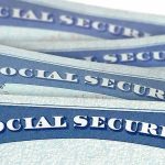 Social Security cards stacked in a close-up view