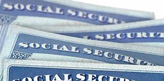ICE Busts Social Security Theft Ring Social Security cards stacked in a close-up view