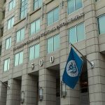 Dems Pushing Reparations For So-Called ICE Raid Victims U.S. government building facade with American and blue departmental flags