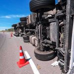 Child Left With Half a Skull After Illegal Trucker Crash! Overturned truck on highway with traffic cones