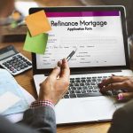 Civil Rights Boss Had SECRET Neo-Nazi Lover! Laptop displaying refinance mortgage application form