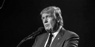 Trump Just Declared War on the International Criminal Court Donald Trump speaking at a microphone in a black-and-white photo