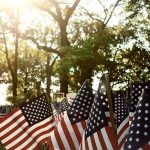 American flags displayed outdoors at a memorial