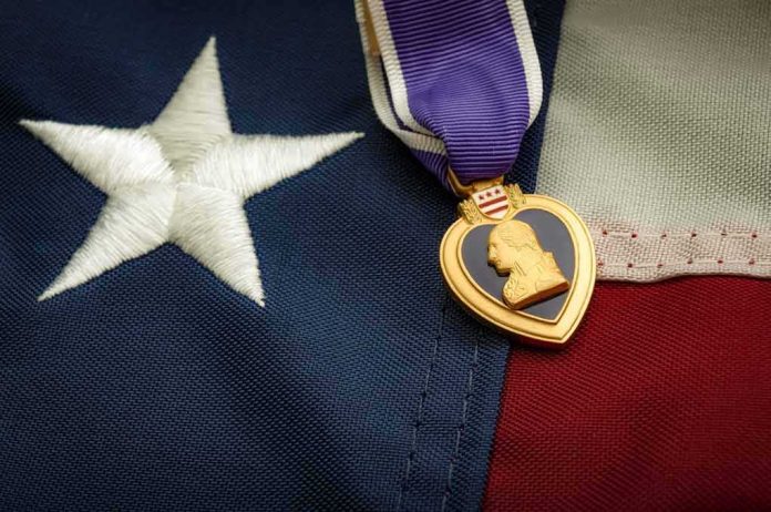 Purple Heart medal on an American flag