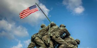 Beloved Iwo Jima Outrage: Marine Beheaded By Migrant Marine Corps War Memorial with soldiers raising a U.S. flag