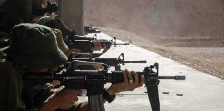 Execution Expert Explains How To Properly Perform Punishment Soldiers lying prone firing rifles at a shooting range