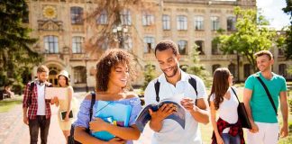 Another Frat Bathroom Rape Sparks Outrage College students walking on campus with books and backpacks